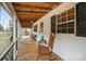 Charming front porch with wood flooring and a rocking chair at 3966 Peach St # 56, Newton, NC 28658