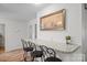 Breakfast bar with granite countertops and three barstools at 3966 Peach St # 56, Newton, NC 28658