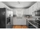 Updated kitchen with stainless steel appliances and lots of cabinets, great for cooking at 3966 Peach St # 56, Newton, NC 28658