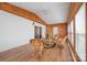 Relaxing sunroom with natural light, wood paneling, and comfortable seating at 3966 Peach St # 56, Newton, NC 28658
