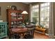 Cozy dining area with classic wood furniture, view of the backyard, and ample natural light at 4006 Hickory View Dr, Fort Mill, SC 29707