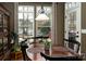 Charming dining area with wood table and chairs, bright window views, and pleasant natural lighting at 4006 Hickory View Dr, Fort Mill, SC 29707