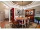 Elegant dining room with a classic chandelier, stylish decor, and ample room for entertaining at 4006 Hickory View Dr, Fort Mill, SC 29707