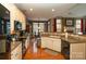 Well-equipped kitchen overlooking the living room and dining area, with modern appliances and tile backsplash at 4006 Hickory View Dr, Fort Mill, SC 29707
