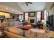 Inviting living room featuring a cozy fireplace, plush seating, and an open layout with lots of natural light at 4006 Hickory View Dr, Fort Mill, SC 29707