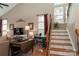 Bright living room with a staircase, fireplace, and comfortable seating at 4006 Hickory View Dr, Fort Mill, SC 29707
