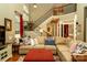 Spacious living room with high ceilings, a staircase, and elegant decor at 4006 Hickory View Dr, Fort Mill, SC 29707
