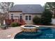 Inviting pool and spa area with a patio and deck at 4006 Hickory View Dr, Fort Mill, SC 29707