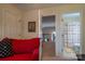 Upstairs featuring an overlook, a red couch, a bathroom, carpet and an off-white color scheme at 4006 Hickory View Dr, Fort Mill, SC 29707
