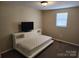 Cozy bedroom with a bed and built-in storage, perfect for a relaxing retreat at 44 Fenix Sw Dr, Concord, NC 28025