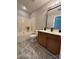 Bright bathroom features a soaking tub, and updated vanity at 4586 Antelope Ln, Charlotte, NC 28269