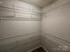 Spacious closet featuring white wire shelving to maximize storage and organization at 4586 Antelope Ln, Charlotte, NC 28269