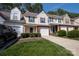 Charming townhome featuring a well-manicured lawn, attached garage and lovely curb appeal at 4586 Antelope Ln, Charlotte, NC 28269