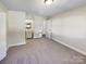 Large bedroom with a view to the hall and featuring an ensuite bathroom at 4808 Cedar Ct, Gastonia, NC 28056