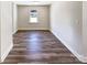 Bright and spacious bedroom with hardwood floors, base molding, and a well-lit interior at 4808 Cedar Ct, Gastonia, NC 28056