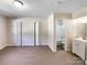 Spacious bedroom featuring an ensuite bathroom and closet spaces at 4808 Cedar Ct, Gastonia, NC 28056