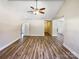 A bright and airy living room offers ample space with hardwood floors, high ceilings, and neutral colors at 4808 Cedar Ct, Gastonia, NC 28056