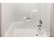 Close-up view of a pristine white bathtub with chrome fixtures at 4808 Cedar Ct, Gastonia, NC 28056