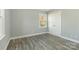 Bedroom features luxury vinyl plank flooring, fresh paint, and ample closet space at 5717 Ruth Dr, Charlotte, NC 28215