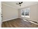Bright bedroom features hardwood floors and large windows at 603 N Elm St, Cherryville, NC 28021