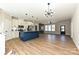 Spacious open kitchen with island, modern appliances, wood floors and lots of light at 603 N Elm St, Cherryville, NC 28021