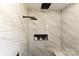 Modern shower with beautiful marble tile and matte black shower heads at 603 N Elm St, Cherryville, NC 28021
