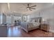 Comfortable bedroom with large windows and wooden floors at 627 Birdie Ln # 21/22, Norwood, NC 28128