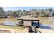 Waterfront boat dock with covered area, perfect for boating and enjoying lake at 627 Birdie Ln # 21/22, Norwood, NC 28128