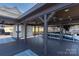 Waterfront boat dock with covered area, perfect for boating and enjoying the lake at 627 Birdie Ln # 21/22, Norwood, NC 28128