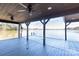 Covered boat dock with ceiling fans and deck space, perfect for enjoying the lake at 627 Birdie Ln # 21/22, Norwood, NC 28128