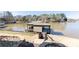 Waterfront boat dock with covered area, perfect for boating and enjoying lake at 627 Birdie Ln # 21/22, Norwood, NC 28128