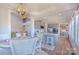 Open-concept kitchen with modern appliances and an eat-in island, seamlessly connected to the living spaces at 627 Birdie Ln # 21/22, Norwood, NC 28128