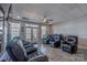 Spacious living room with leather recliners, a fireplace, and a view of the outdoors at 627 Birdie Ln # 21/22, Norwood, NC 28128