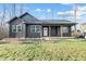 Charming one-story home featuring a covered front porch and manicured lawn at 7595 Lakehaven Dr, Denver, NC 28037