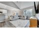 Open-concept living room flows into the kitchen and dining area, perfect for entertaining at 7595 Lakehaven Dr, Denver, NC 28037