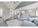 Spacious living area with modern gray walls and hardwood floors at 7595 Lakehaven Dr, Denver, NC 28037