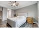 Comfortable main bedroom with a tray ceiling and neutral walls at 7595 Lakehaven Dr, Denver, NC 28037