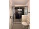 Stylish bathroom with a glass-enclosed shower, black accents, and modern tile design at 803 Fargo Dr, Concord, NC 28027