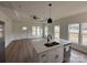 Bright living area featuring hardwood floors, recessed lighting, and an open kitchen layout at 803 Fargo Dr, Concord, NC 28027