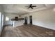 Bright, open-concept living area flows into the kitchen, featuring stylish flooring and ample space at 803 Fargo Dr, Concord, NC 28027