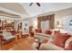 Bright living room featuring hardwood floors, comfortable sofas, and elegant decor at 8439 Sonata Ct, Denver, NC 28037