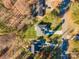 Aerial view showcases the home, green lawn, driveway, and neighborhood layout from above at 110 Hazelton Loop, Mooresville, NC 28117