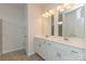 Bathroom featuring dual vanity, white cabinetry, and tile flooring at 1101 Red River Dr, Salisbury, NC 28144