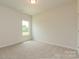 Bright, carpeted bedroom with window providing natural light at 1101 Red River Dr, Salisbury, NC 28144