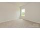 Carpeted room with a window bringing in natural light at 1101 Red River Dr, Salisbury, NC 28144