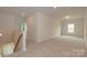 Spacious upstairs loft features neutral carpet and great natural light from a window at 1101 Red River Dr, Salisbury, NC 28144