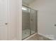 Modern bathroom showcasing a glass-enclosed tile shower at 1101 Red River Dr, Salisbury, NC 28144