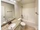 Bathroom with granite vanity, toilet, and shower/tub combination at 11123 River Oaks Nw Dr, Concord, NC 28027