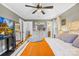 Spacious main bedroom featuring hardwood floors, natural light, and ensuite access at 1116 Berry Ridge Rd, Charlotte, NC 28270