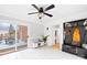 Bright sunroom with white tile floors, sliding glass doors, and backyard access at 1116 Berry Ridge Rd, Charlotte, NC 28270